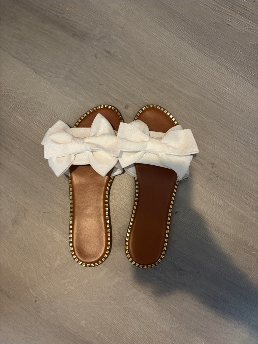 Amazon White Bow Slide Sandals with Gold-Trim Footbed